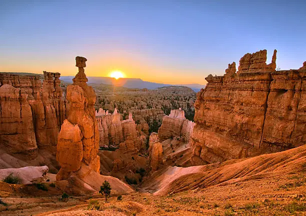 The sun rising above Thor's Hammer at Bryce Canyon National Park, Utah.  