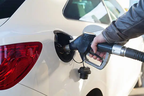 Photo of car at gas station