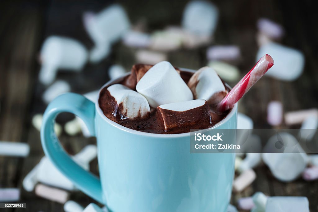 Mug filled with hot chocolate and marshmallow  and candy, coseup Aromatherapy Stock Photo