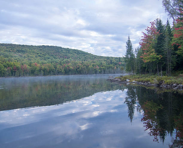 istock Lake and mountains at the beginning of fall 523726675