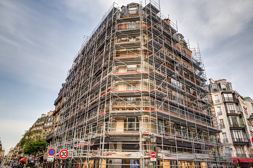 Downtown Paris, this building is encased in scaffolding so that it can be restored.