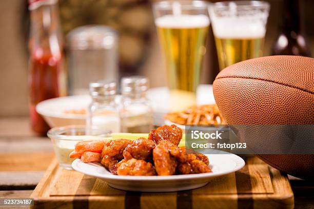 Pub Food Snacks Beer Football Spicy Chicken Wings Stock Photo - Download Image Now