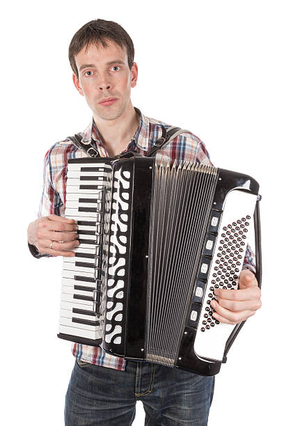 istock Man playing an accordion isolated over white 523735443