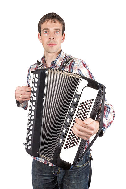 istock Man playing an accordion isolated over white 523735455