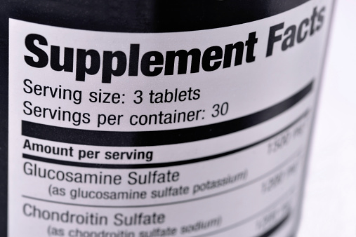 Closeup of a bottle of nutritional supplements