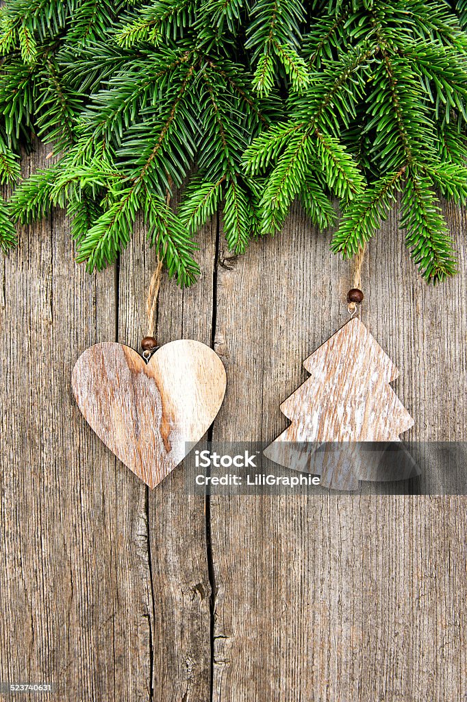 fresh christmas tree branch with vintage decoration fresh christmas tree branch with vintage decoration over wooden background 2013 Stock Photo