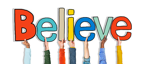 istock Group of Hands Holding Letter Believe 523741103