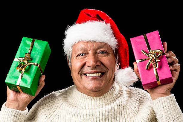 istock Hilarious Senior Offering Green And Pink Gift 523741955
