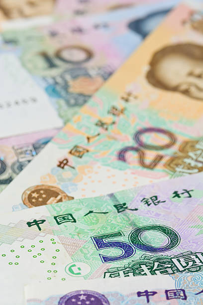 istock chinese Yuan bank notes (renminbi), for money concepts 523749579