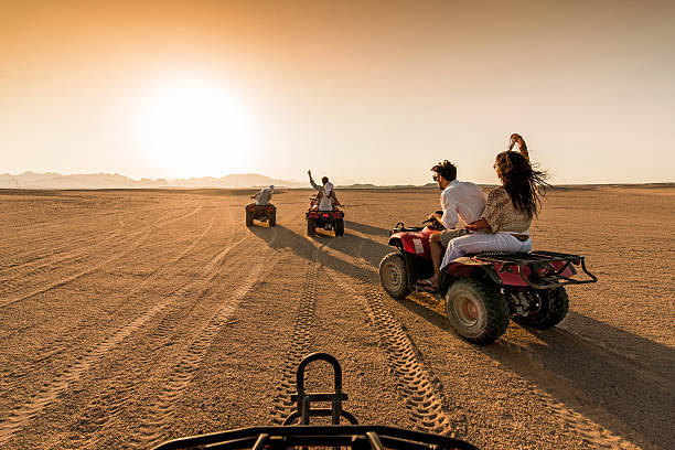 istock Driving quad bikes in the desert. 523751263
