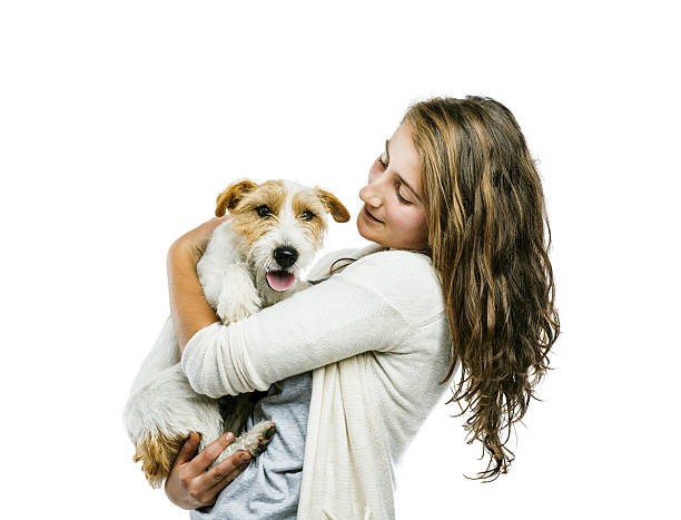 istock Woman playing with dog isolated 523752111