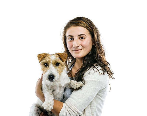 istock Woman playing with dog isolated 523752115