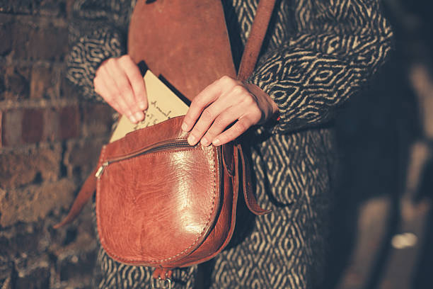 istock Woman with letter at sunset 523752201