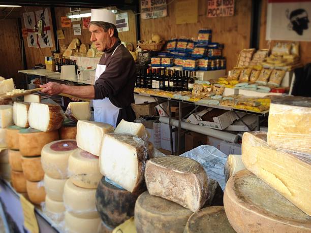 Outdoor market stall selling cheese in Piazza Bra, the main square of Verona, Italy.