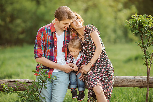 istock Happy family in a park 523760978