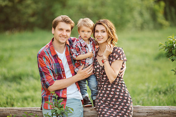 istock Happy family in a park 523761052