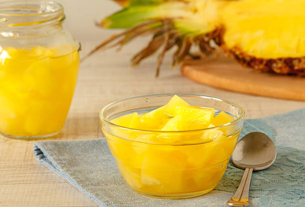 Canned pineapple cubes stock photo