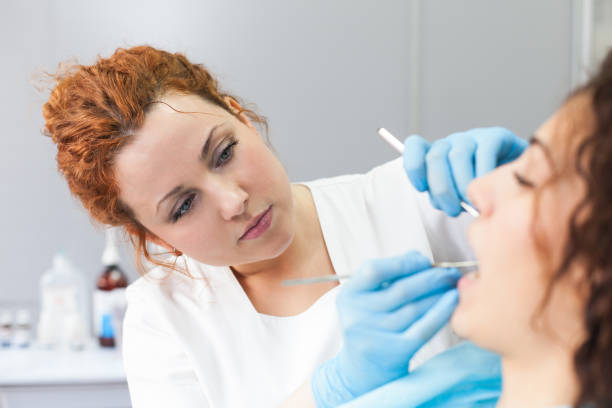 istock Young woman patient and dentist 523766968