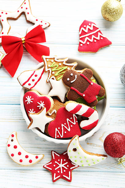 istock Christmas cookies in bowl on a blue wooden table 523769544