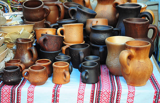 istock Traditional Ceramic Jugs and cups on Decorative Towel. 523769830