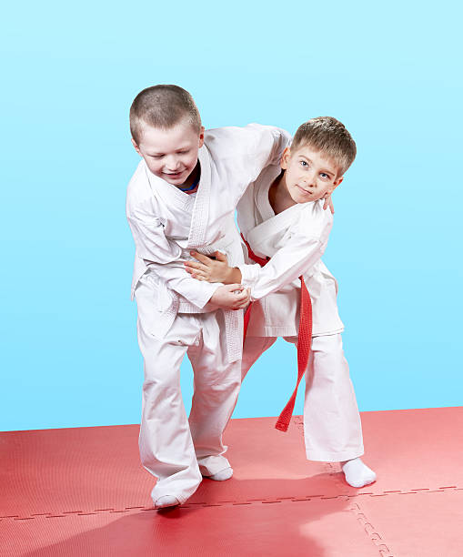 istock Kids in kindergarten are trained Judo technique 523771580