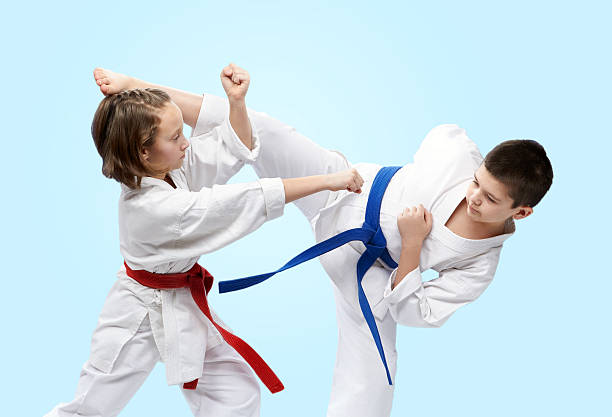 istock On a light background athletes train blocks and kicks karate 523771738