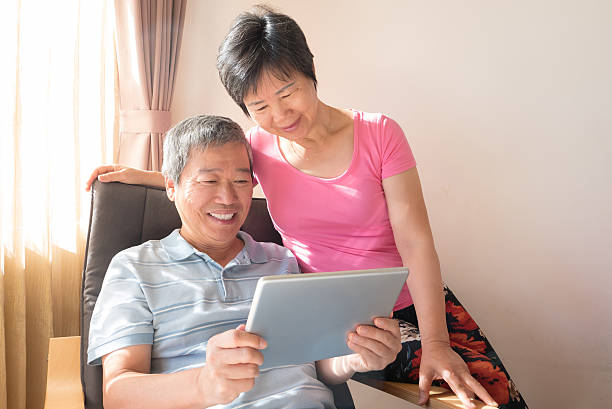 istock Happy Senior couple with tablet 523773960