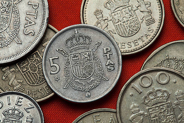Coins of Spain. Spanish national emblem Coins of Spain. Coat of arms of Spain depicted in the Spanish 5 peseta coin. number 5 photos stock pictures, royalty-free photos & images
