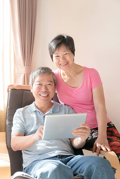 istock Happy Senior couple with tablet 523774022
