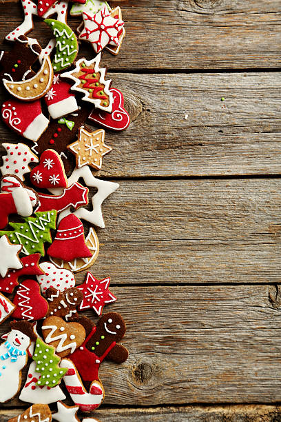 istock Gingerbread cookies on a grey wooden table 523776182