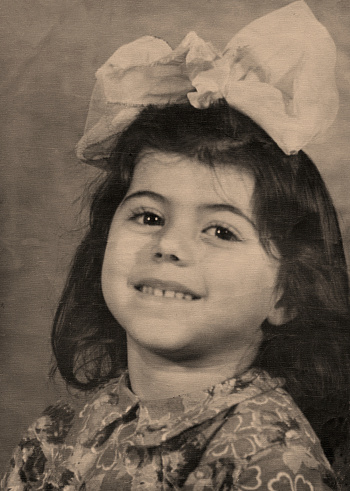 Vintage studio close up portrait of a child, taken in the Northern Caucasus area of Russia,1960