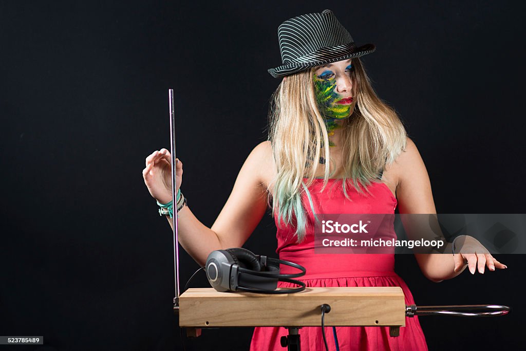 Theremin Girl plays theremin Music Stock Photo