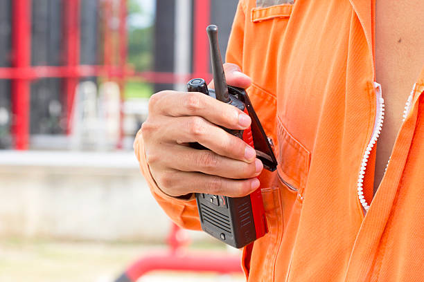 istock man with walkie talkie for outdoor 523786953