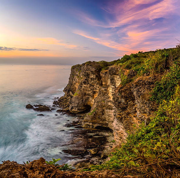 istock Sunset at Uluwatu cliff 523787833