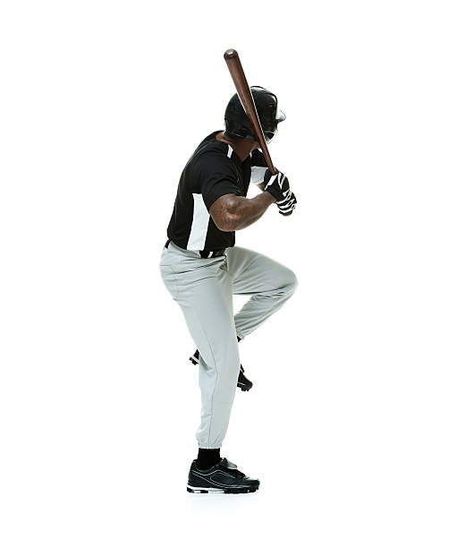 istock Rear view of baseball player in action 523788305