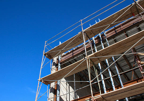 istock Wood scaffolding at a construction site 523789195