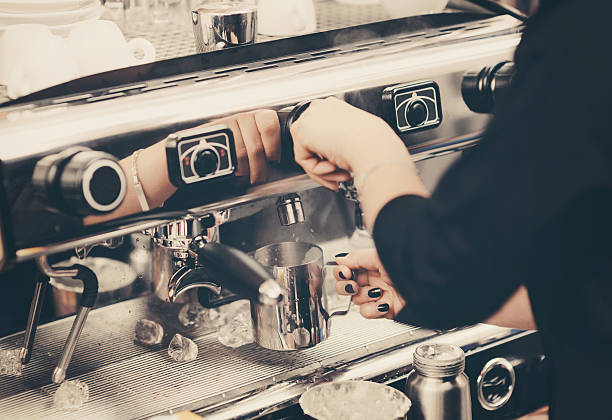 istock Young barista is making a coffee 523818504