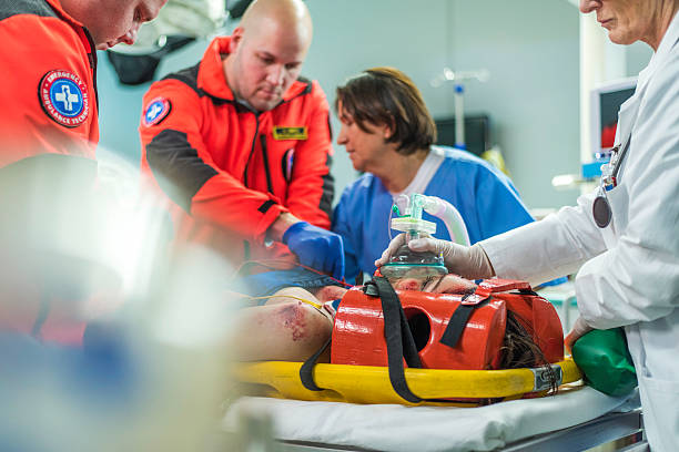 istock Paramedics and doctors in emergency room 523818842