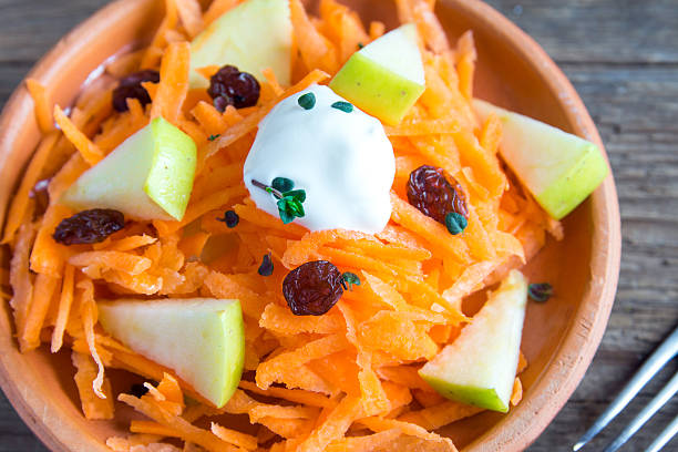 istock Carrot and apple salad with raisins 523820436