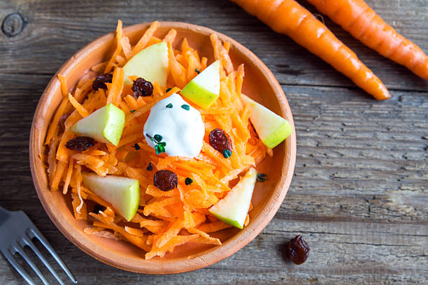 istock Carrot and apple salad with raisins 523820592