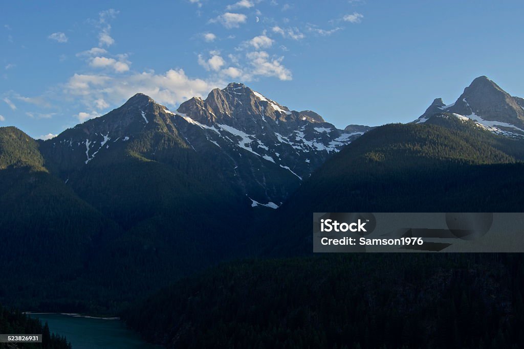 Diablo Lake Summer Peaks Northern Washington's Cascade Range. Extreme Terrain Stock Photo