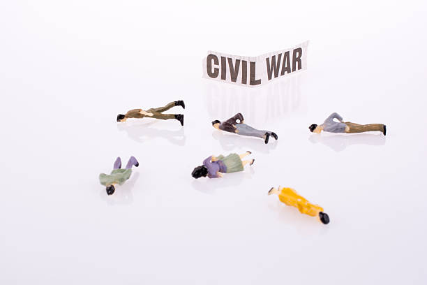 istock Figures near Newspaper Title 523827668