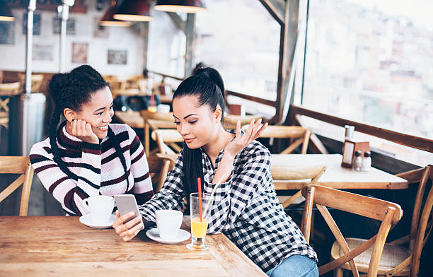 istock Two friends drinking coffee in a bar 523827888