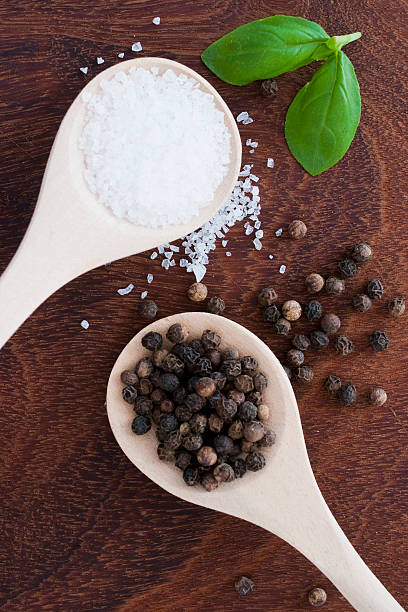 istock salt and pepper on wooden background 523829003