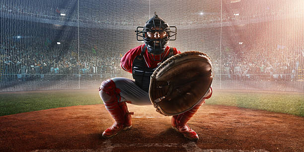 Baseball catcher on stadium Image of a baseball catcher ready to catch baseball. He is wearing unbranded generic baseball uniform. The game takes place on outdoor baseball stadium full of spectators. The stadium is made in 3D. baseball pitcher baseball player baseball diamond stock pictures, royalty-free photos & images