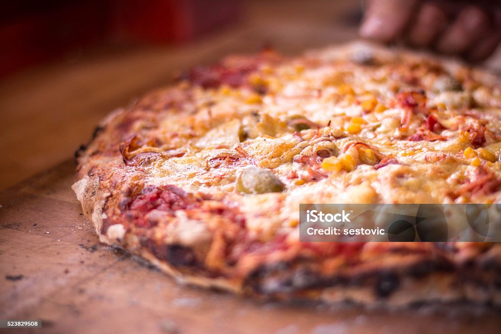 Preparing pizza at home Adult Stock Photo