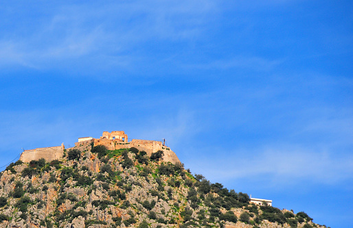 Béjaïa / Bougie, Kabylia, Algeria: Yemma Gouraya mountain and its 16th century fort built by the Spanish. The fortress houses the tomb of Yemma Gouraya, Bejaia's islamic patron saint (Marabout), till its destruction in the 19th century 
