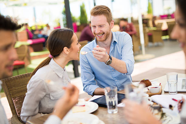 istock Lovely couple eating dessert in cafe 523832332