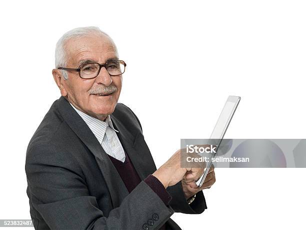 Retired Senior Man Holding Digital Tablet With Clipping Path Stock Photo - Download Image Now