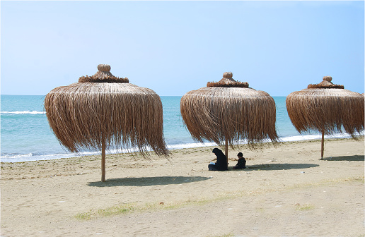 A Syrian Refugee is looking and praying for her country from Mersin / Turkey side of Mediterranean.